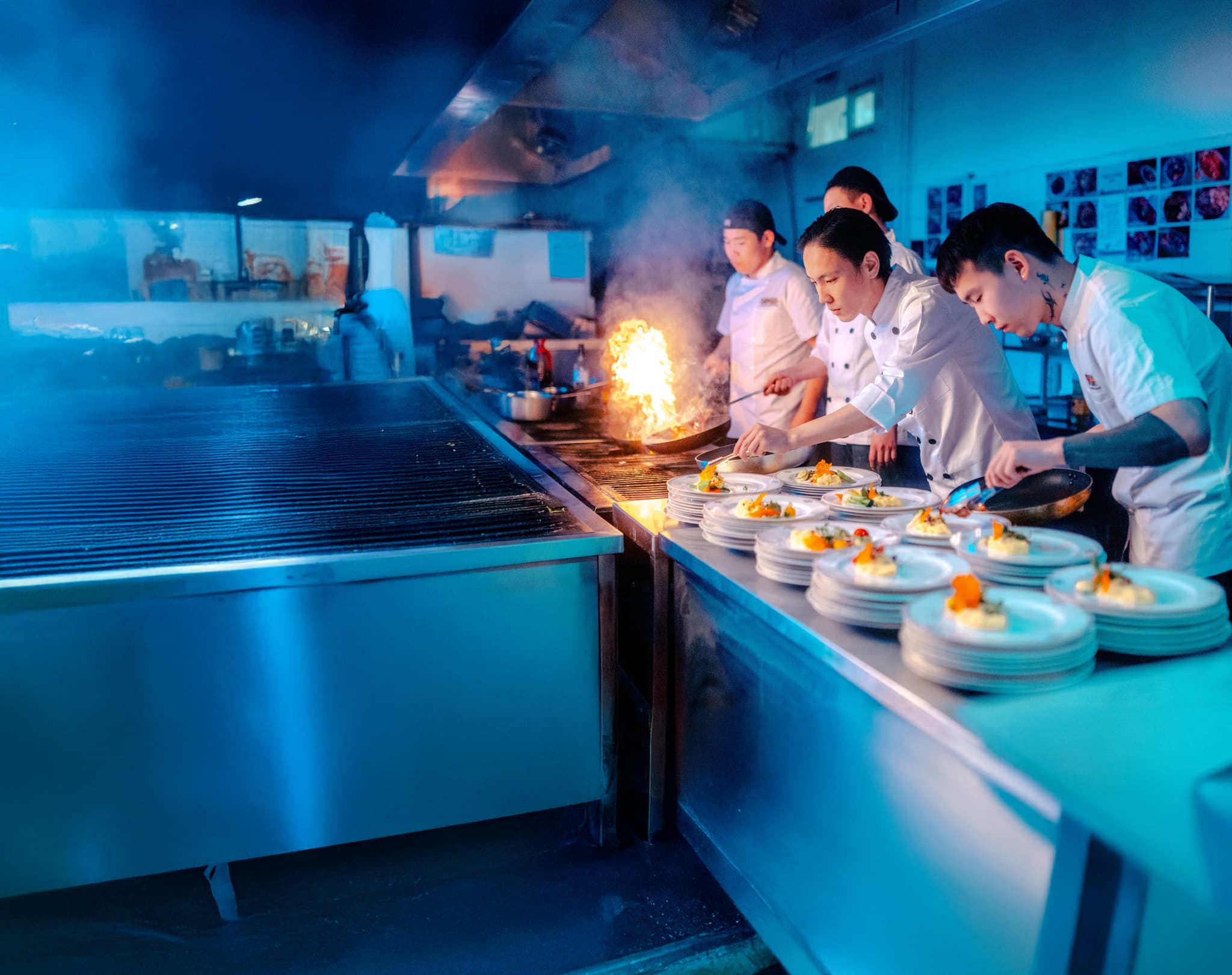 Professional chefs working in kitchen