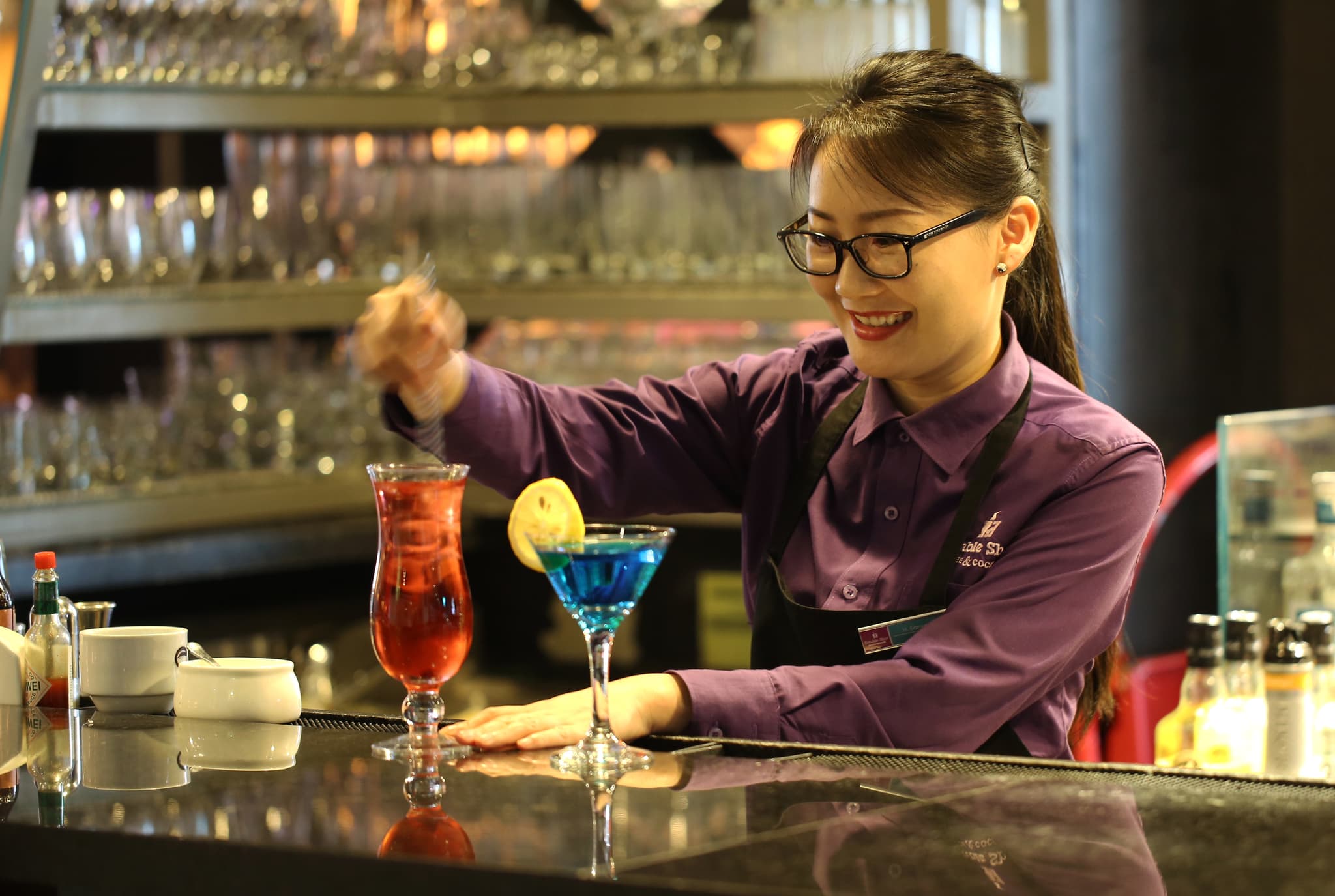 Bartender serving drinks